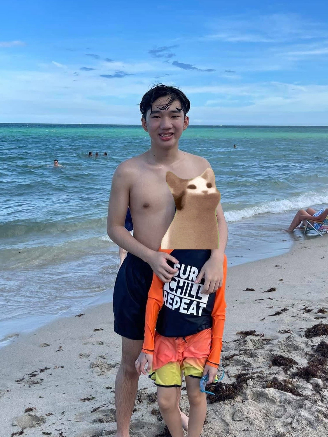 Khoi standing by the ocean